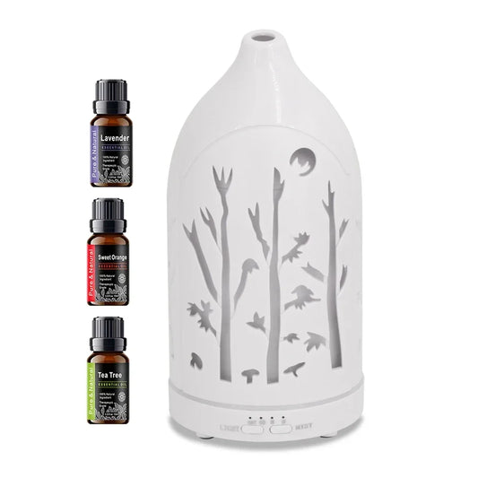 7 Color LED Aromatherapy Diffuser with Hollow Out Design Includes 3 Essential Oils, Auto Shut Off, Ultra Quiet Operation for Ho